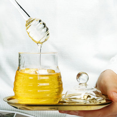 Tarro de la miel del vidrio de Borosilicate con el goteador Eco a prueba de calor amistoso proveedor